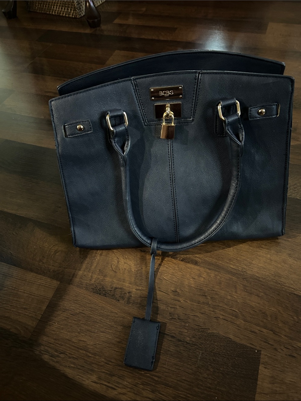 BCBG dark navy leather satchel with gold-tone lock